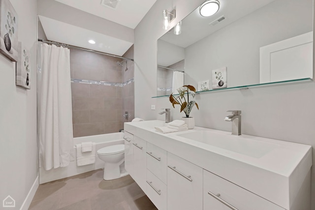 full bathroom with shower / tub combo with curtain, vanity, toilet, and tile patterned floors