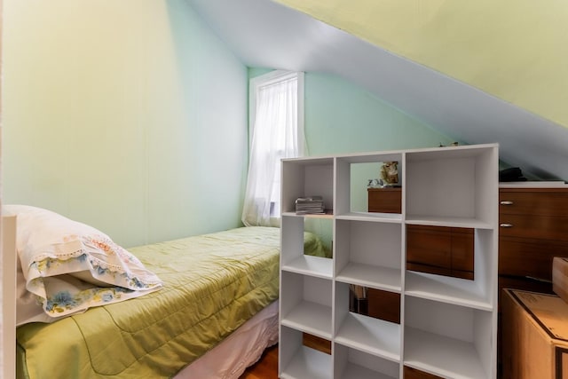 bedroom with vaulted ceiling