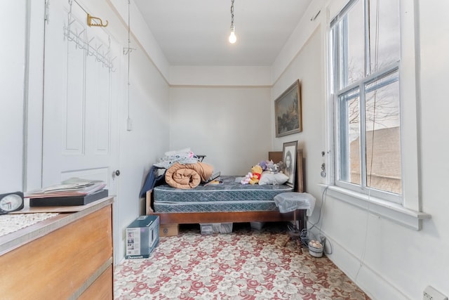 bedroom with a baseboard radiator