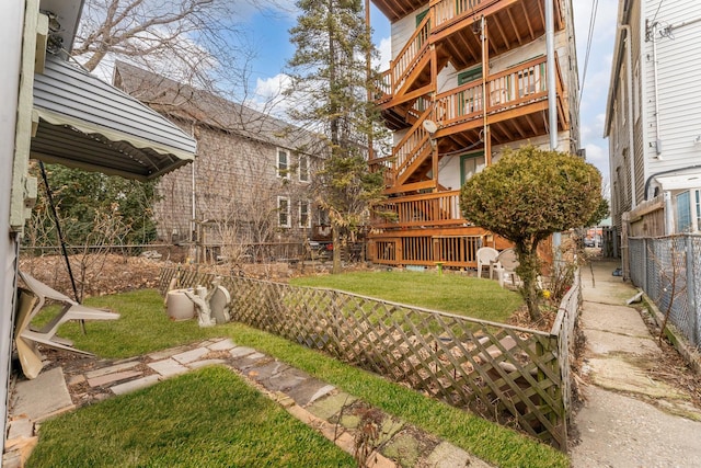 view of yard featuring a wooden deck