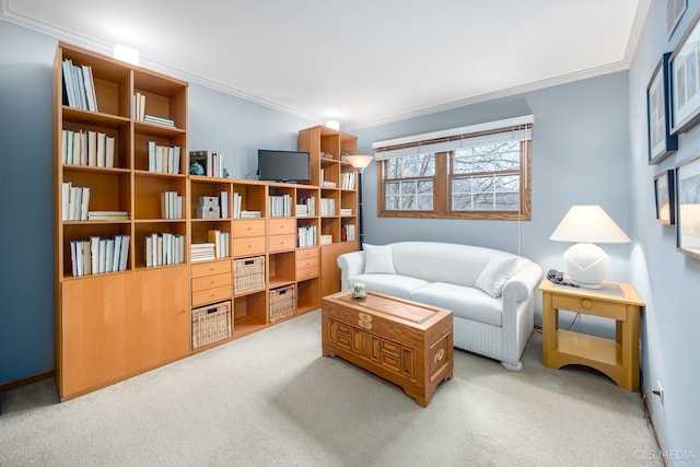 living area featuring crown molding and light colored carpet