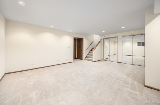 basement with light colored carpet