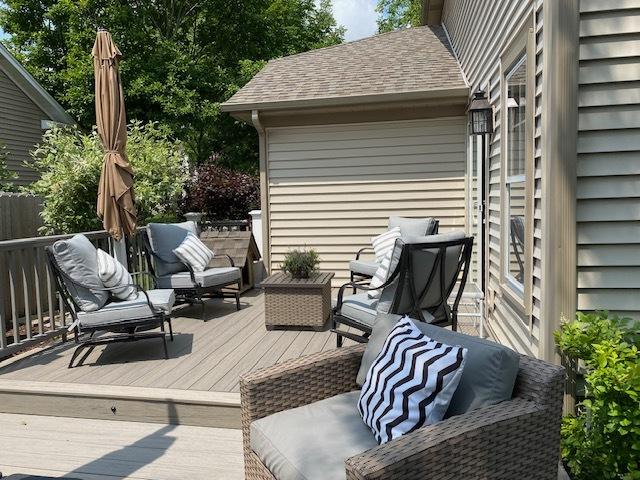 wooden terrace with outdoor lounge area