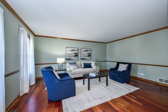 living room featuring ornamental molding and dark hardwood / wood-style floors