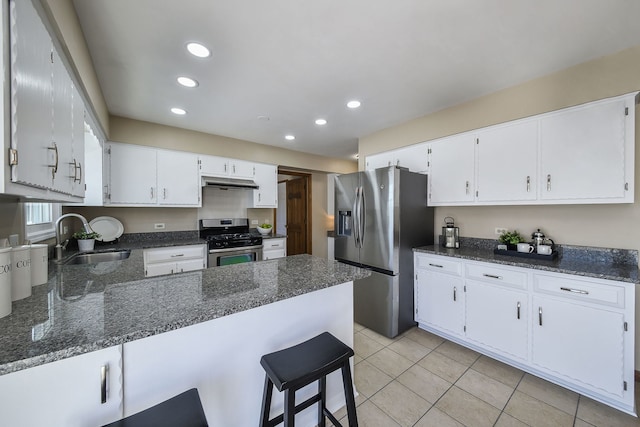 kitchen featuring white cabinetry, sink, and appliances with stainless steel finishes