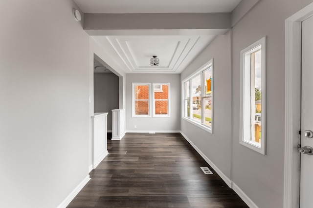 corridor featuring dark hardwood / wood-style flooring