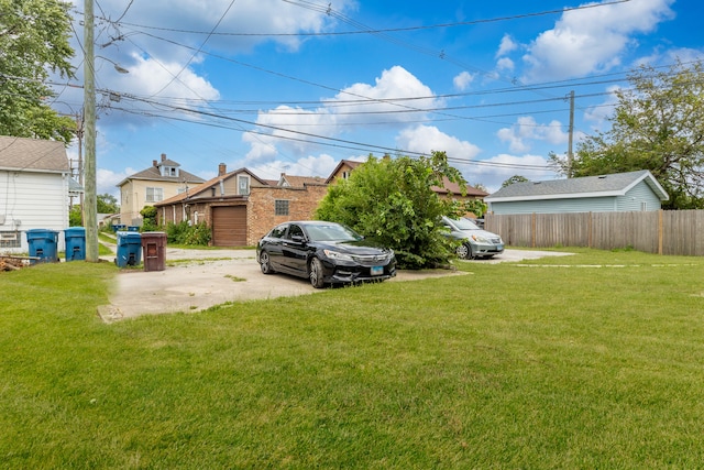 view of yard with a garage