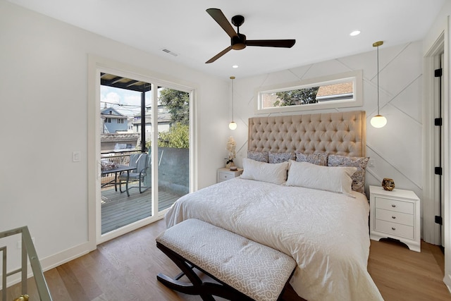 bedroom with hardwood / wood-style flooring, ceiling fan, and access to outside