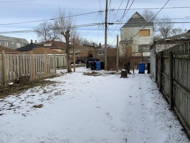 view of yard covered in snow