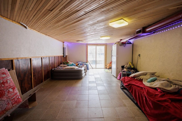 tiled bedroom with wooden ceiling