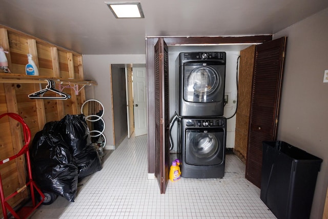 laundry room with stacked washer and clothes dryer