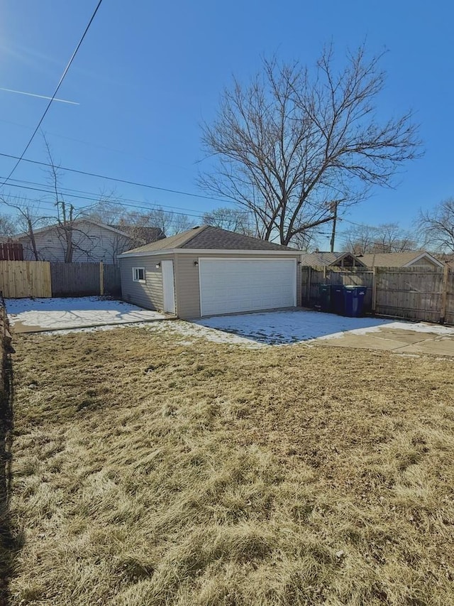 garage with a lawn