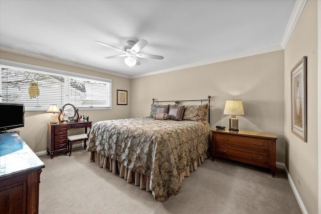 bedroom featuring ornamental molding, light colored carpet, and ceiling fan