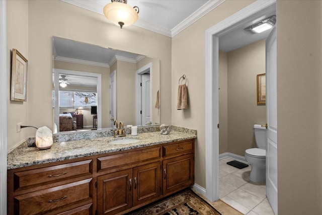 bathroom with ornamental molding, tile patterned floors, toilet, and vanity