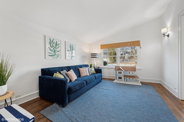 living room with dark hardwood / wood-style flooring and lofted ceiling