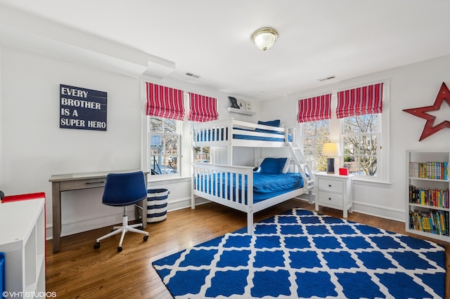 bedroom featuring wood-type flooring