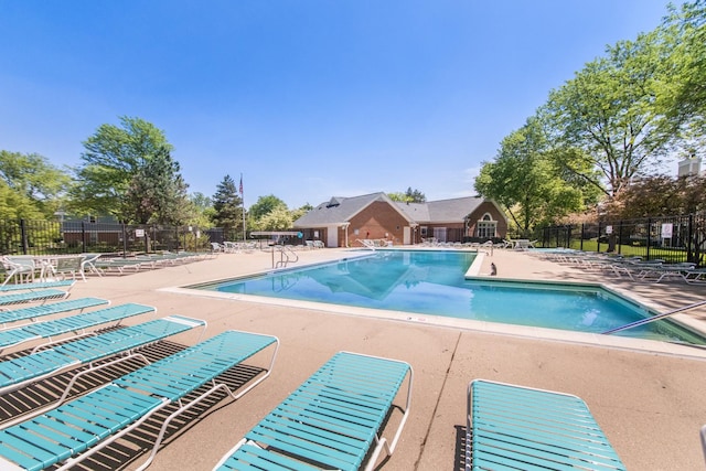 view of swimming pool featuring a patio