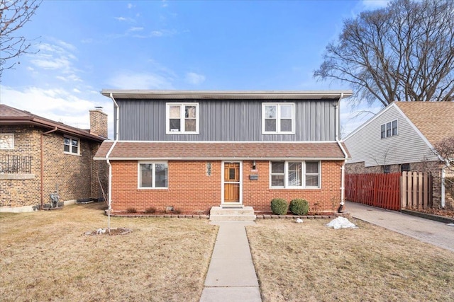 view of front property with a front lawn