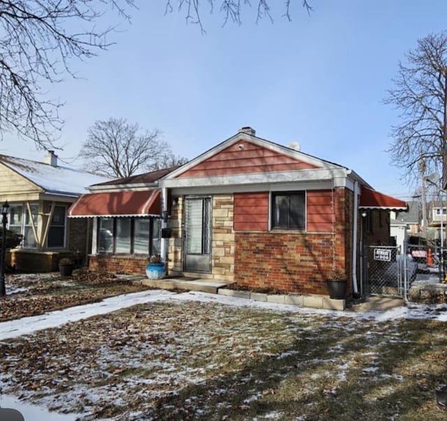 view of snow covered house