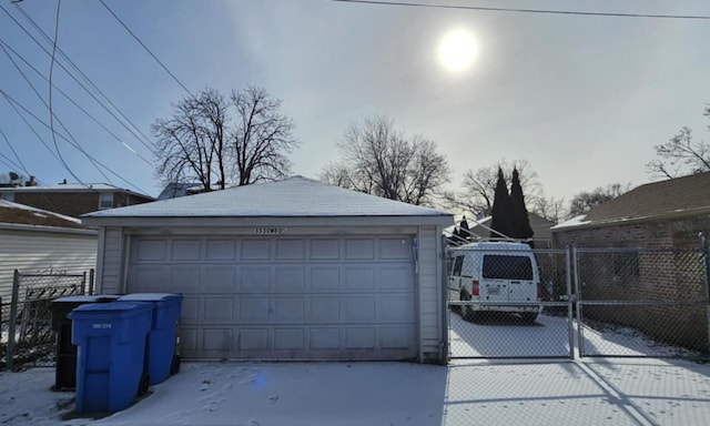 view of snow covered garage