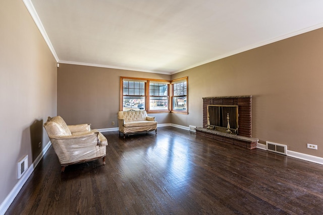 unfurnished room with crown molding, a brick fireplace, and dark hardwood / wood-style flooring