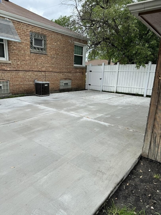 view of patio with central AC