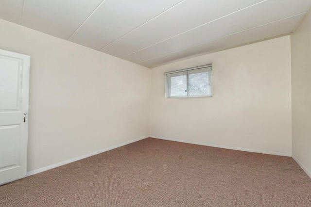 spare room with carpet floors