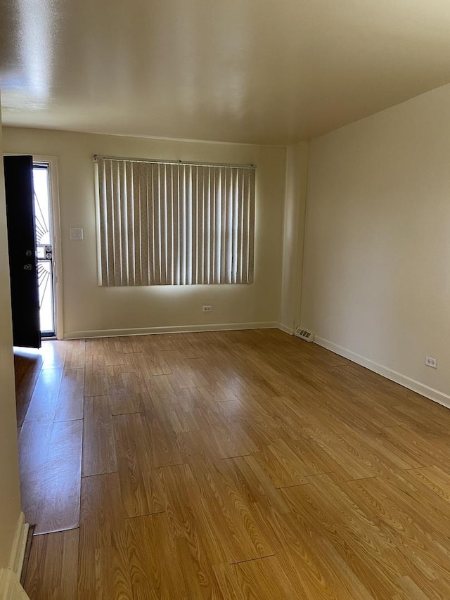 empty room featuring light wood-type flooring