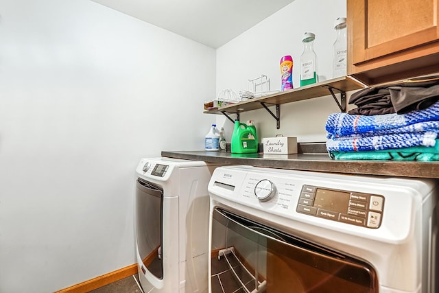 laundry area with cabinets and independent washer and dryer