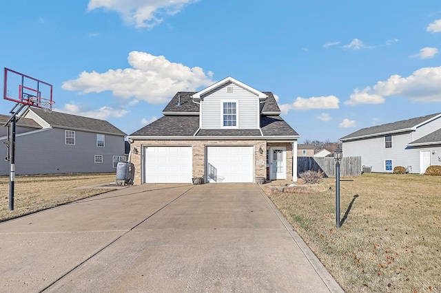 front facade with a garage and a front yard