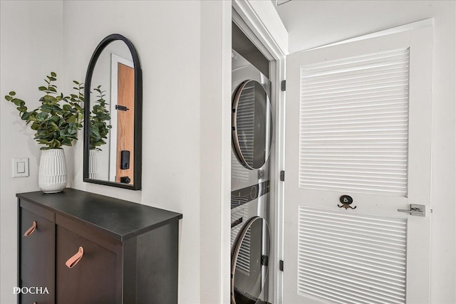 laundry area featuring stacked washer and dryer