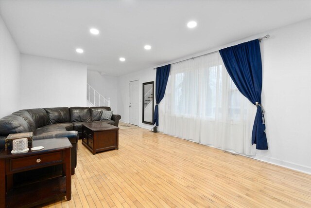 living room featuring light wood-type flooring