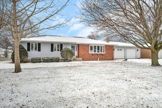 ranch-style house featuring a garage