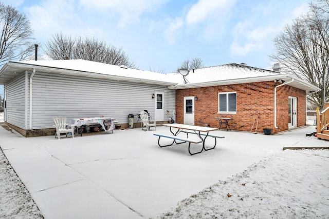 view of snow covered property