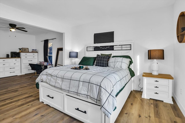 bedroom featuring hardwood / wood-style flooring