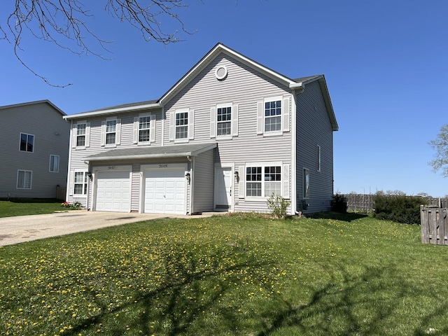 view of front of house featuring a garage and a front yard