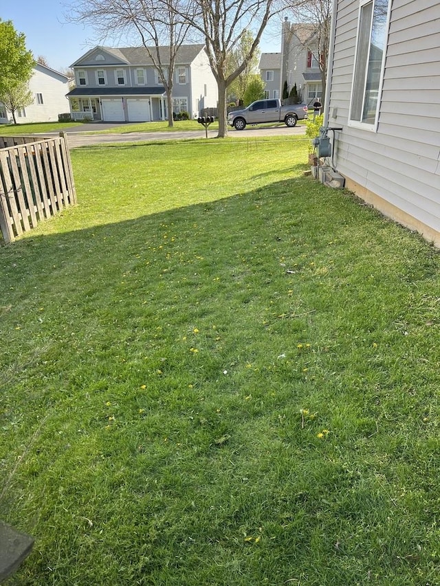 view of yard featuring a garage