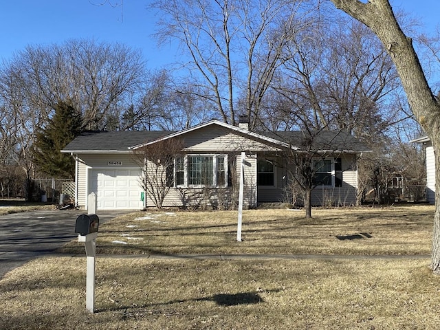 single story home with a garage