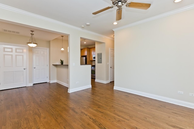 unfurnished living room featuring ceiling fan, ornamental molding, and hardwood / wood-style floors