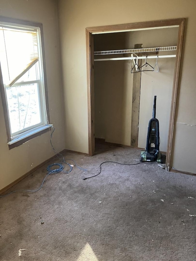 unfurnished bedroom featuring a closet