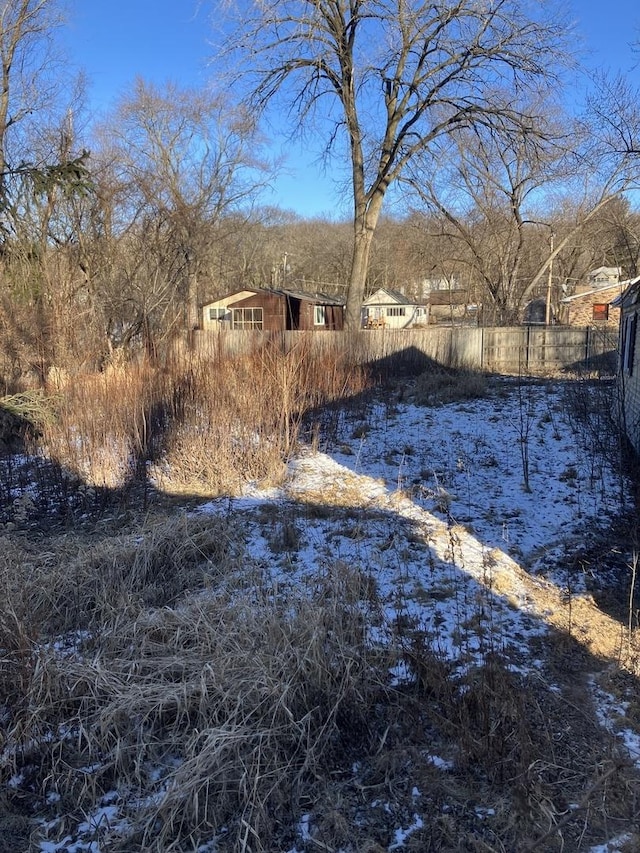 view of yard covered in snow