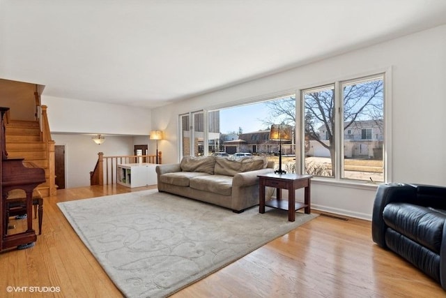 living room with light hardwood / wood-style floors