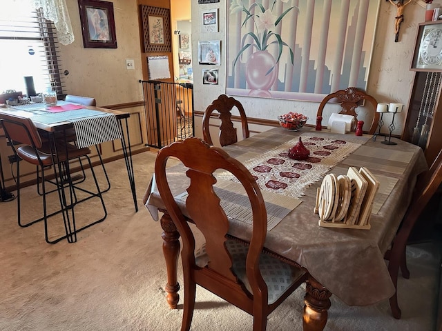 view of carpeted dining space