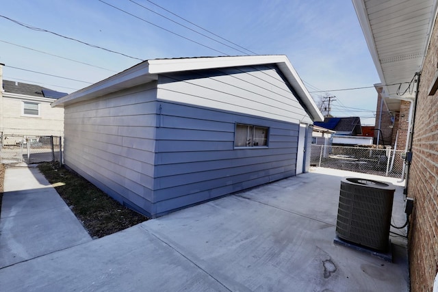 view of home's exterior featuring central AC unit and a patio area