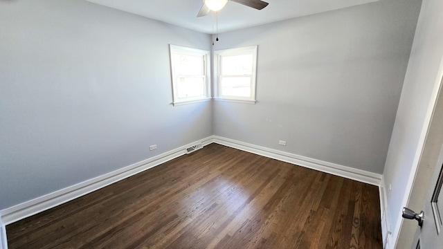 empty room with ceiling fan and wood-type flooring