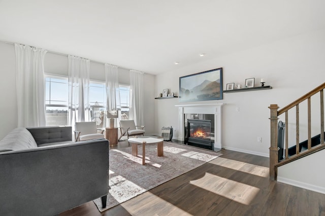 living room with dark hardwood / wood-style floors