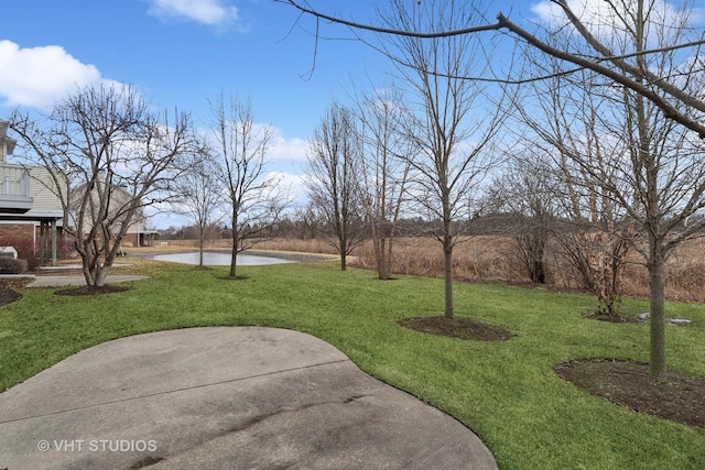 view of yard with a water view