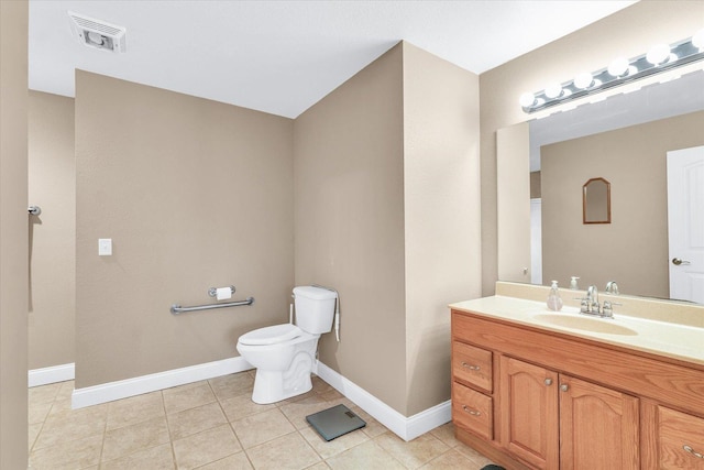 bathroom with tile patterned flooring, visible vents, baseboards, toilet, and vanity