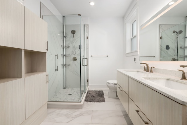 bathroom featuring walk in shower, vanity, and toilet