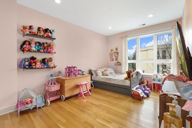 bedroom with light wood-type flooring